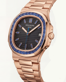 Rose Gold Stainless Steel Watch with Blue Gem Bezel & Black Dial