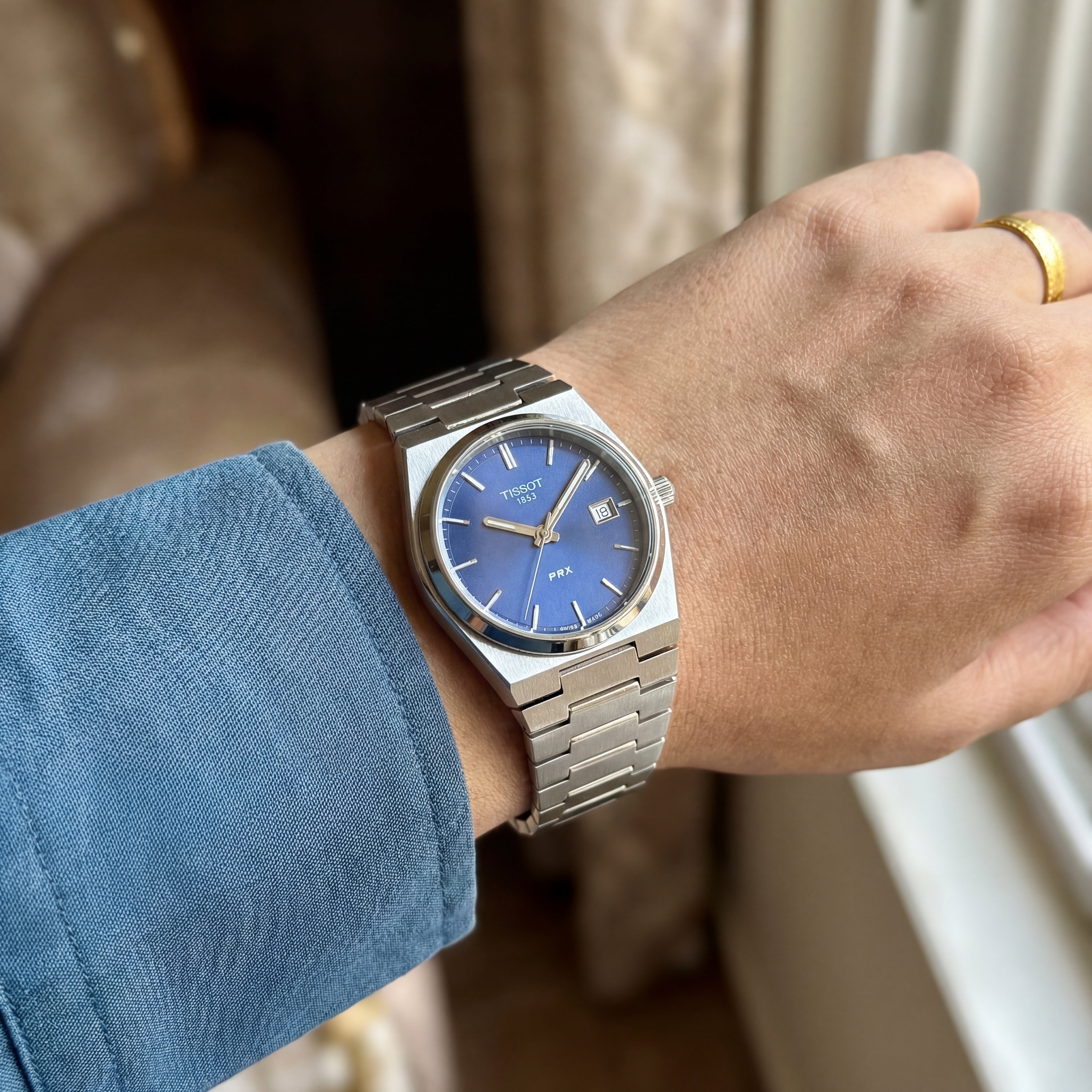Stainless Steel Integrated Bracelet Blue Sunburst Dial Date Watch
