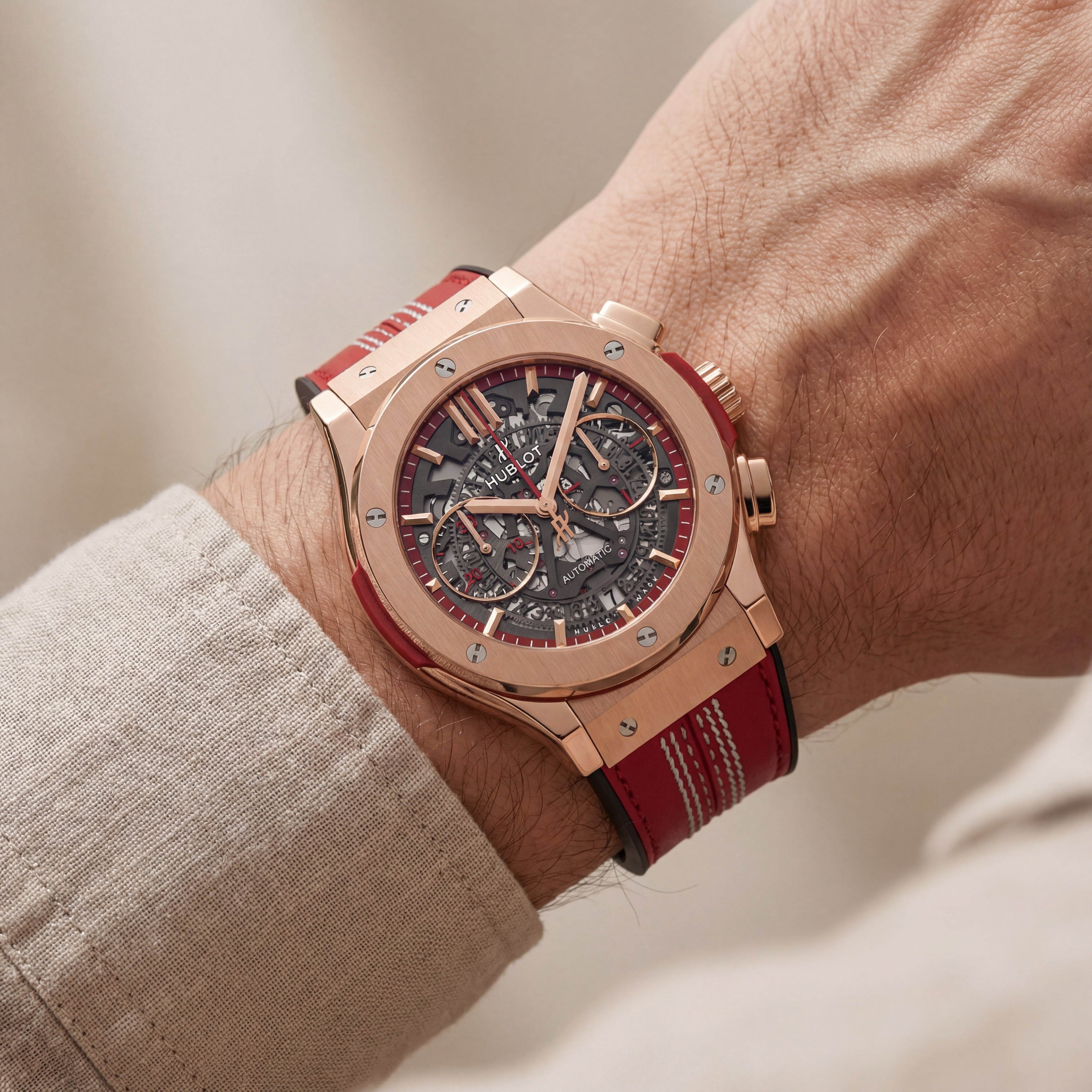 Rose Gold Skeleton Chronograph Watch with Red Leather Strap