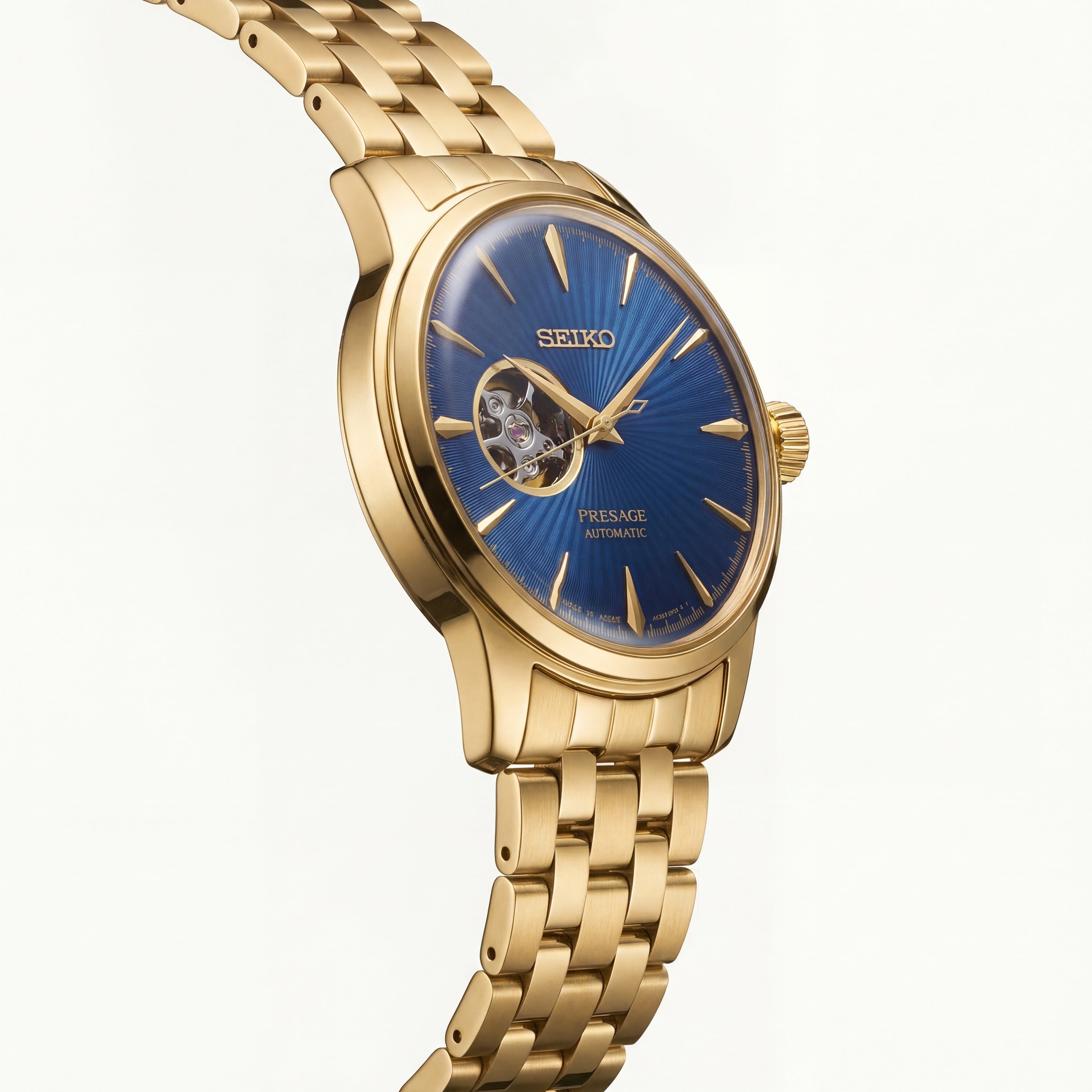 Gold Stainless Steel Case Royal Blue Sunburst Dial Open-Heart Automatic Luxury Bracelet Watch – Men