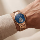 Rose Gold Open Heart Luxury Watch with Blue Textured Dial