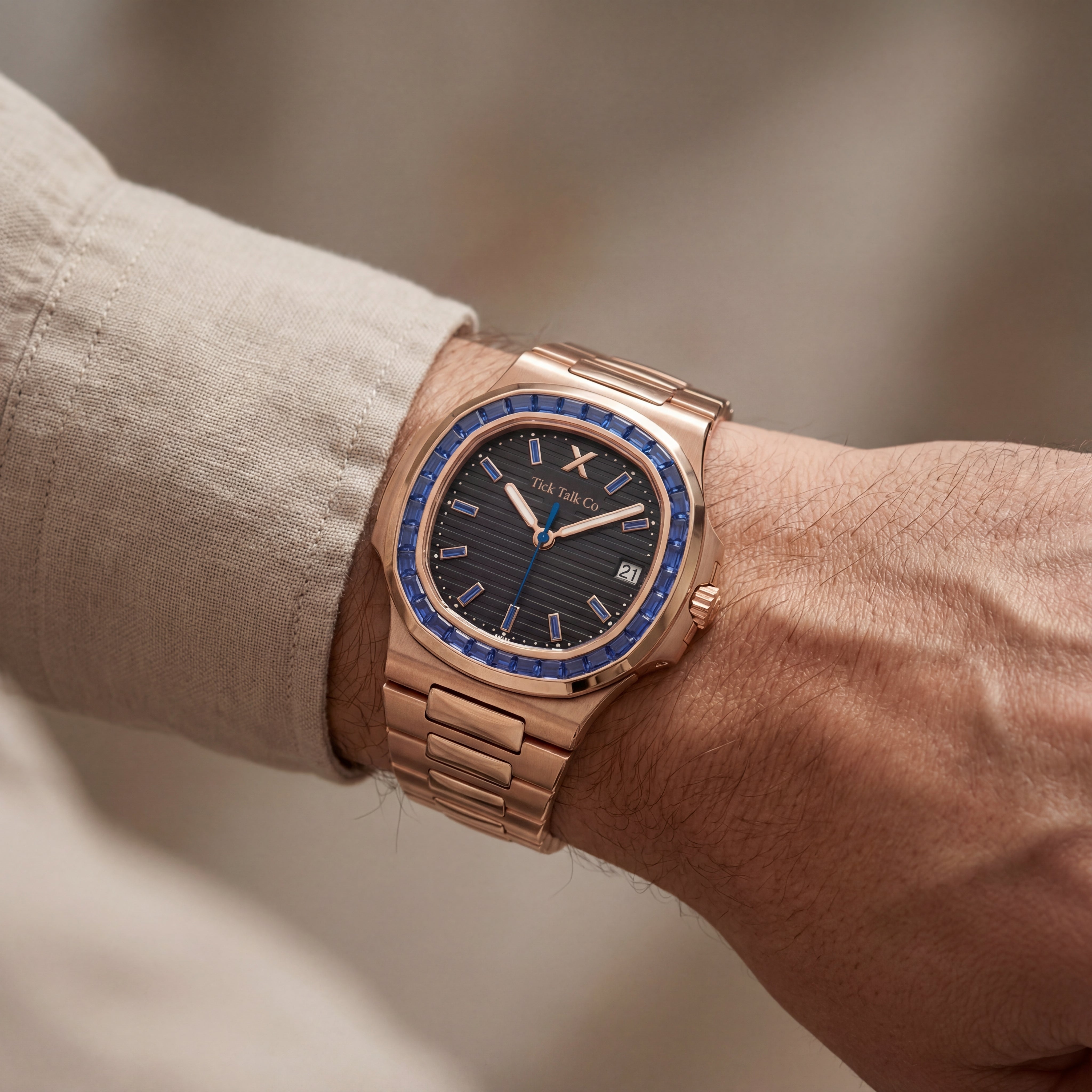 Black Dial Rose Gold Watch with Blue Gem Bezel & Stainless Steel Bracelet