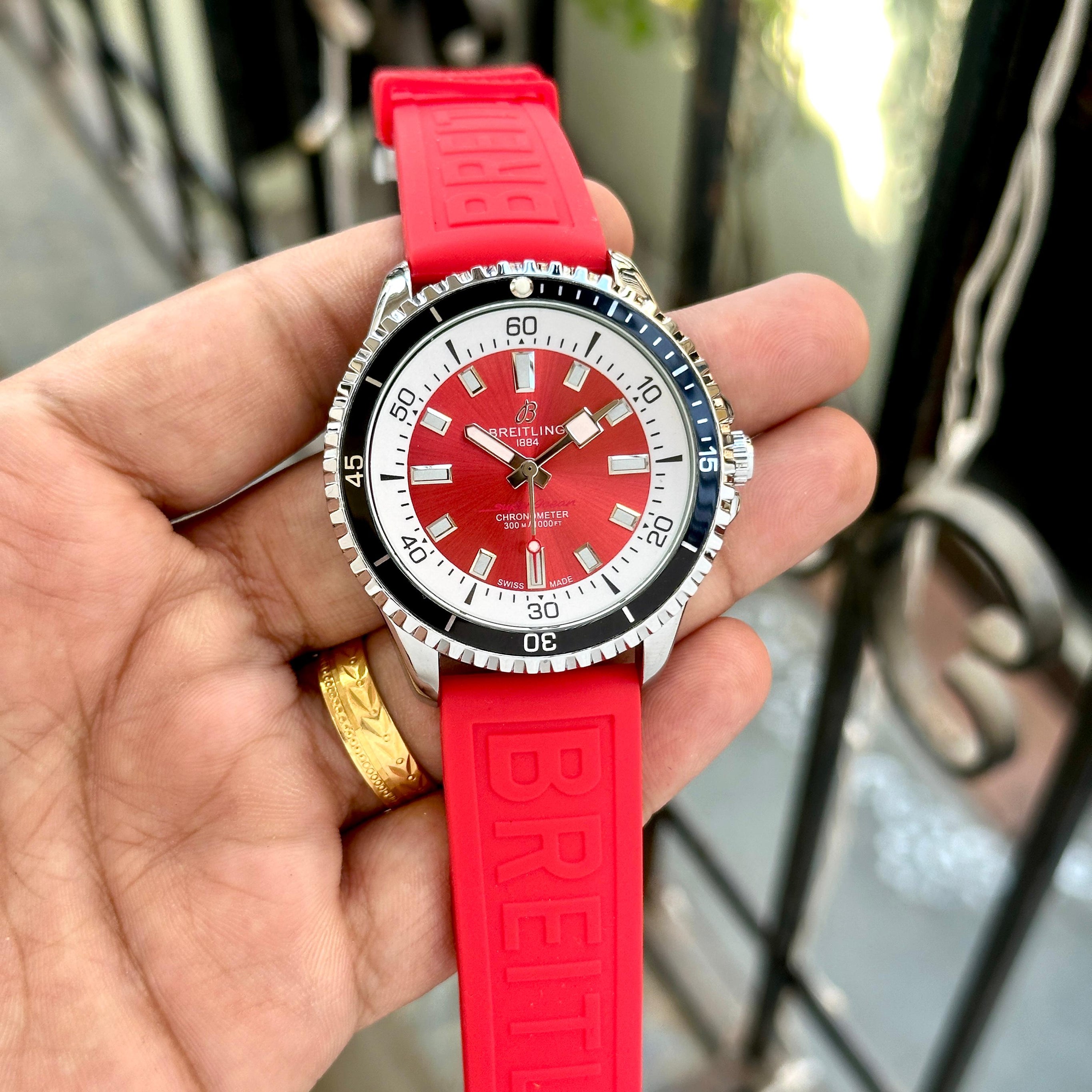 Premium Silver Stainless Steel Sport Watch Red Sunburst Dial Rotating Bezel Red Silicone Strap Luxury Watch – Men
